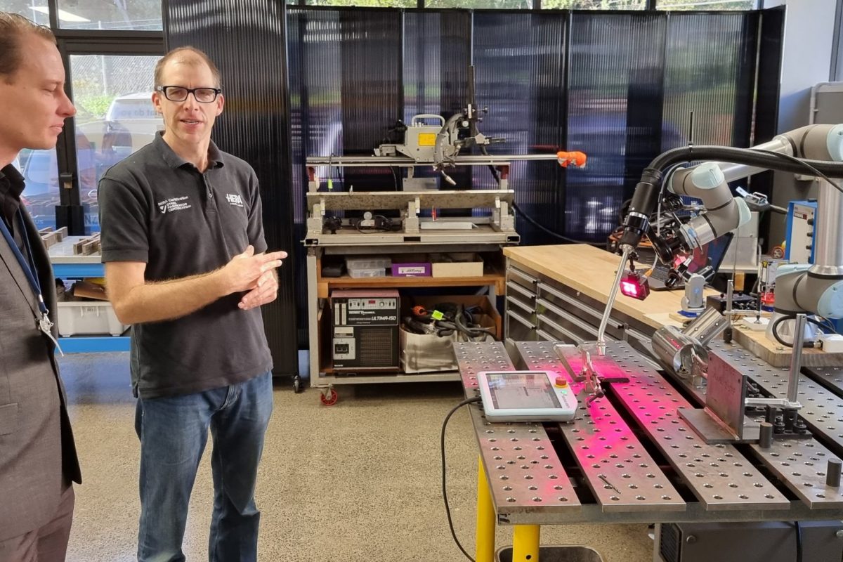 Holger Heinzel demonstrating welding machinery